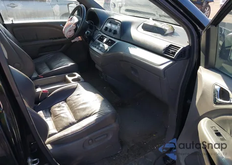 2010 Honda Odyssey Ex-L z USA, uszkodzony, nr VIN 5FNRL3H63AB028662